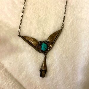 Beautiful charm right in the middle a nice turquoise blackish